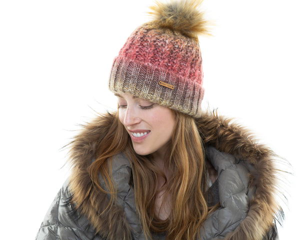 Woman wearing the Alexa Beanie, radiating warmth and style for Fall. 